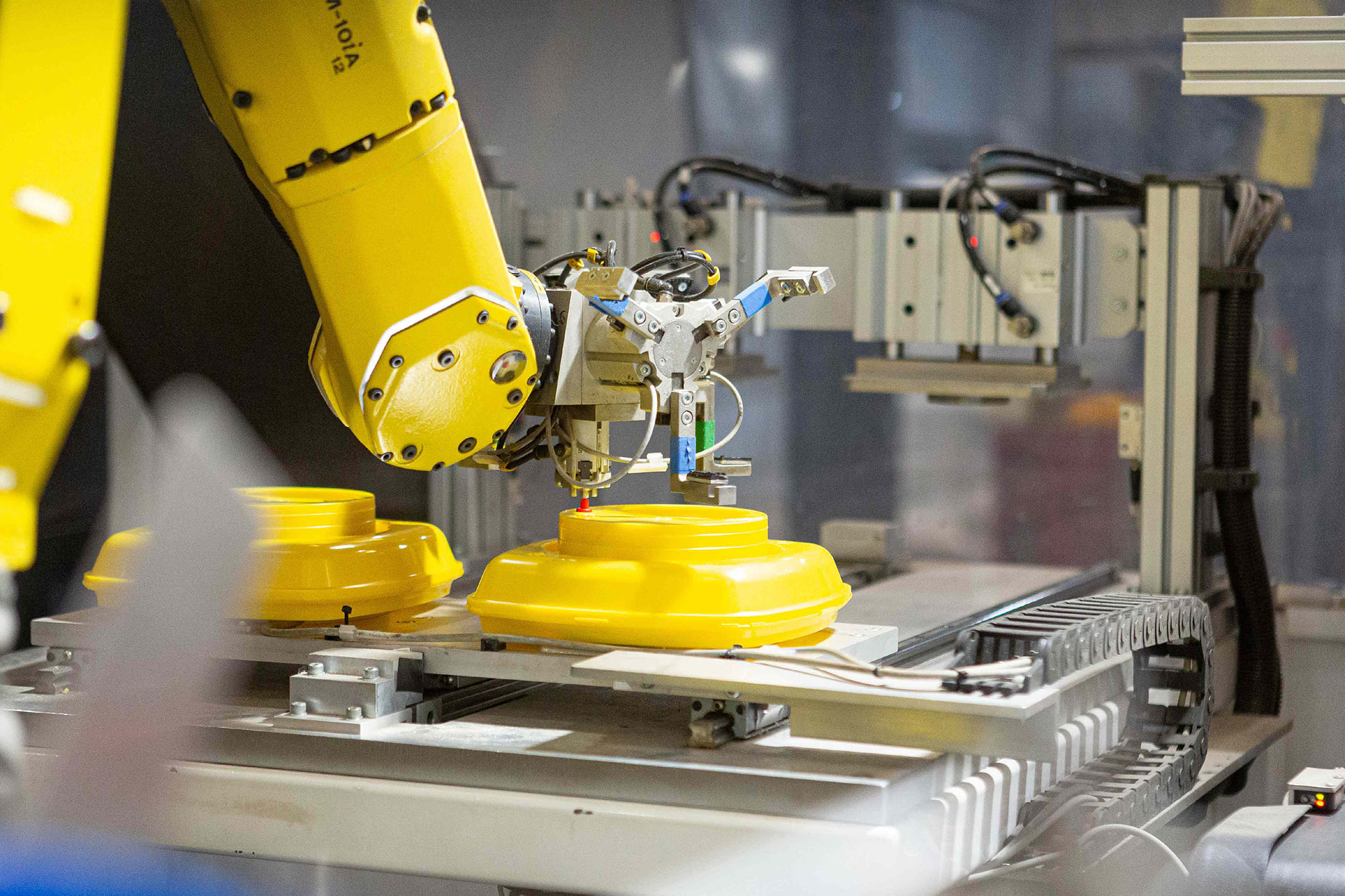 Sophisticated manufacturing service combining component production, robotic and manual secondary process